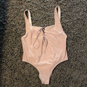 One-piece pink & white striped bathing suit